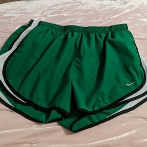 Green Nike shorts